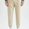DeFacto Regular Fit - Pantalones Deportivos - Beige -Solid Ventas 62413fe56c4b4f39957ed4b9de500a1e