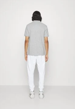 Calvin Klein Wave Lines Pants - Pantalones Deportivos - Bright White 10 Calvin Klein Wave Lines Pants - Pantalones Deportivos - Bright White -Solid Ventas 7dfb207db15045d78e7d6d6be0f417ae